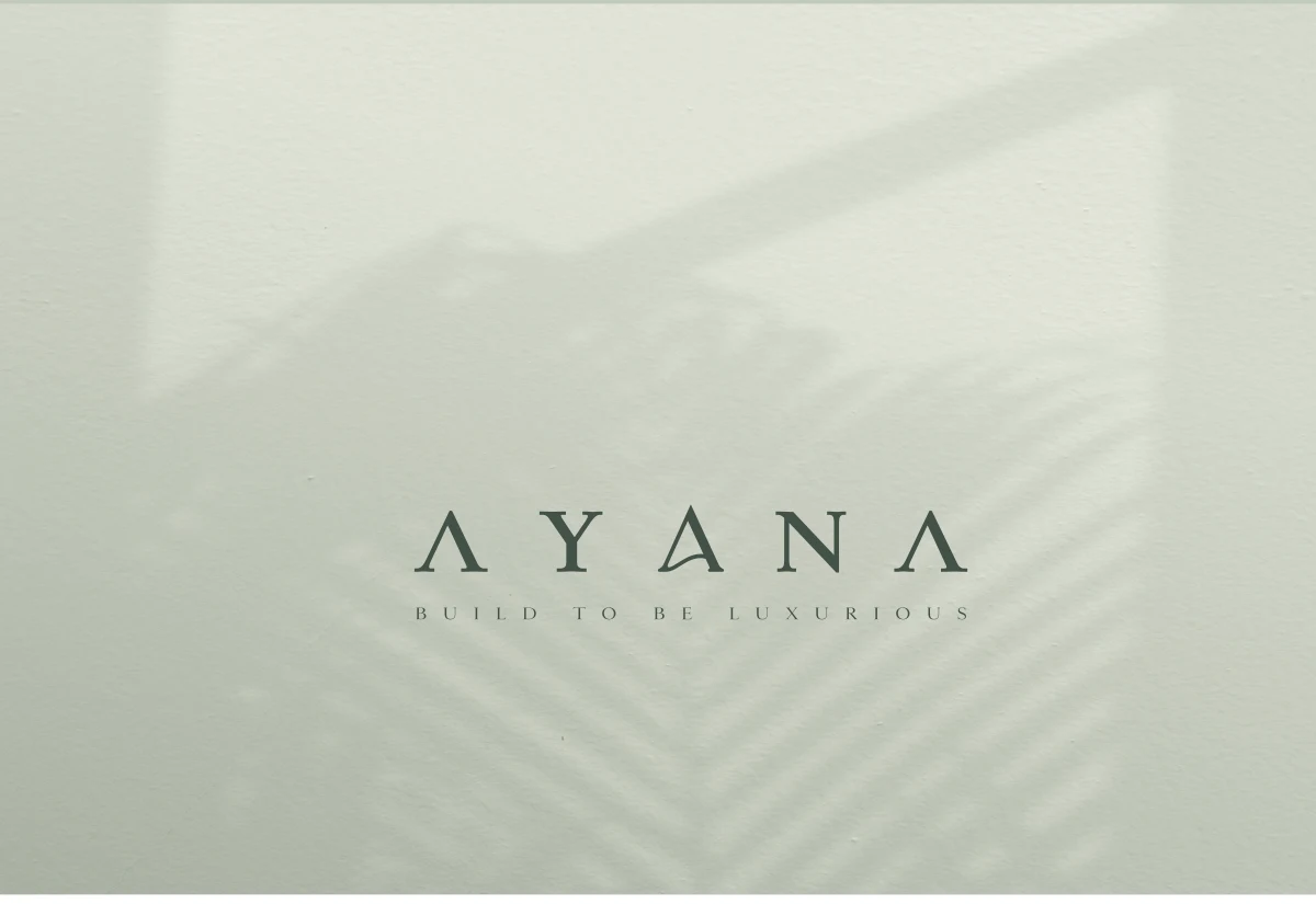 Ayana wordmark on the catalogue’s sage green cover with palm shadows